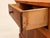 Pair of low corner cabinets with plinths in solid cherry wood, in the Louis-Philippe style. Pentagonal shape...