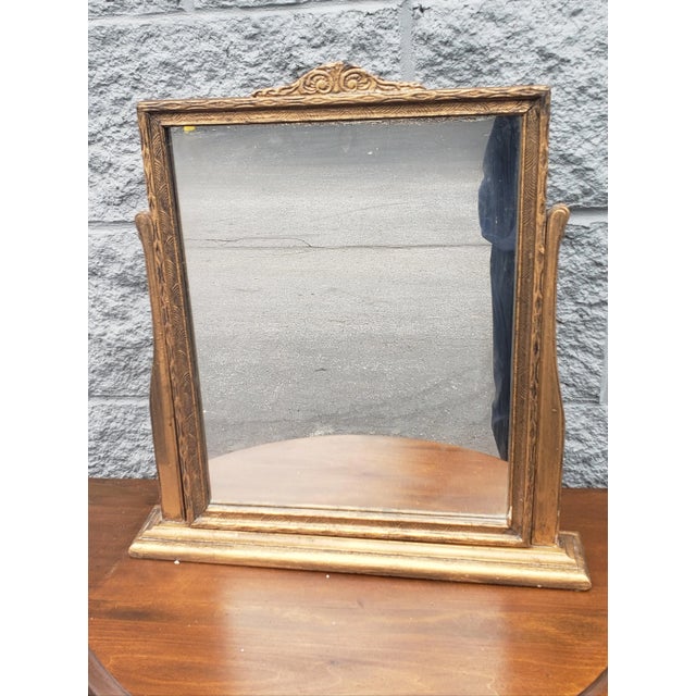 Exquisite art deco giltwood self standing table mirror. Very Good Vintage condition with appropriate with use and history