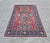 In this listing you will find an antique Kazak Rug with geometrical patterns and vibrant colours. It was hand-knotted in...