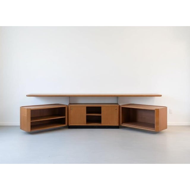Walnut and metal three-piece cabinet, designed by Osvaldo Borsani for Tecno in 1960, model MG14, a modular system with...