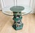 Exquisite 1950s Chinese export ceramic pedestal table featuring intricate openwork decoration and a richly glazed emerald...
