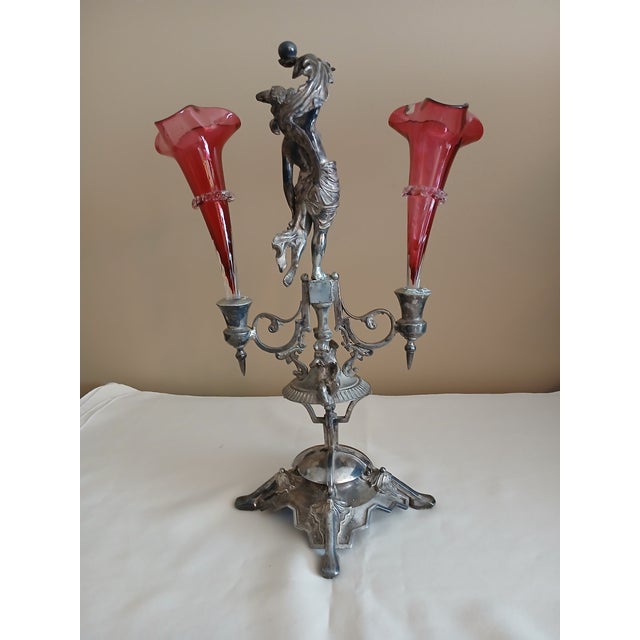 Wilcox figural (cherubs and maybe the goddess Venus) silver plate epergne with cranberry glass bud vases (is a candle...
