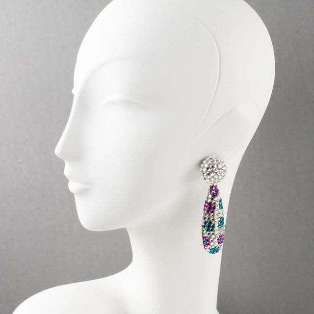Richard Kerr designed these fabulous clip-on earrings in the 1980s. They are made up of his signature pave rhinestones....