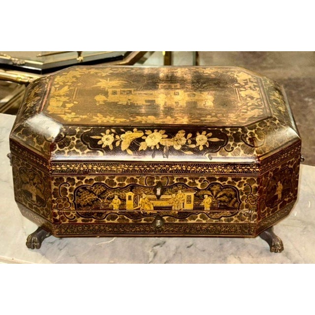 The 19th c. English Chinoiserie Sewing Box is a beautifully crafted decorative collectible featuring intricate designs...