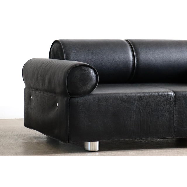 Rare two seater sofa by marzio cecchi, produced in italy during the 1970s. the design is defined by a rectangular base...