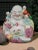 This Vintage Hand Painted Colorful Famille Rose Fertility Happy Buddha Statue originates from China, showcasing the...
