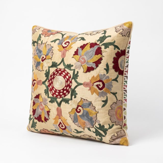 This beautiful hand embroidered suzani fabric is sourced from Uzbekistan. We cut and sew the pillow by hand in our Houston...