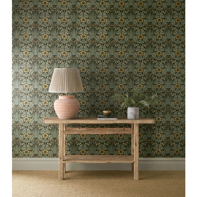 Woodbell & Anemone features a figure-of-eight shape creating a simple ogee pattern. The document was originally a small...