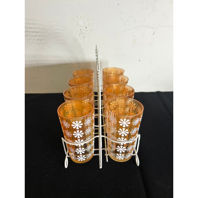 Step back in time with this vintage set of 8 iced tea or lemonade tumblers by Jeannette Glass Co., complete with a...