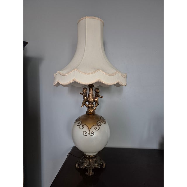 This lamp was made during the glorious Hollywood Regency era. It was part of a movement to bring the glamorous life into...