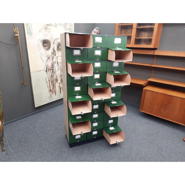 Here's something truly special. A chest of drawers consisting of 30 file boxes. Made of heavy-duty cardboard in the 1950s....