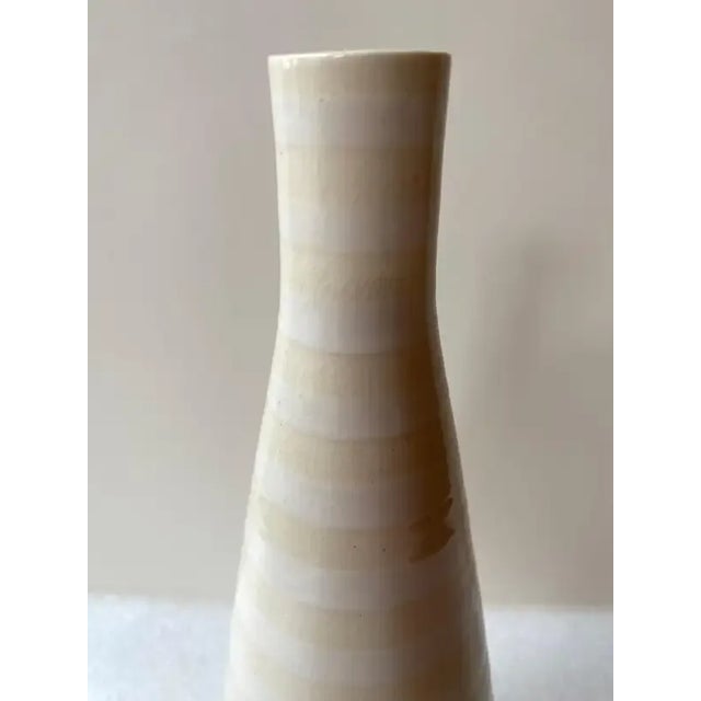 Jonathan Adler Hand-Thrown and painted 14" tall vase. Nice condition with one very small rim chip as seen in photo.