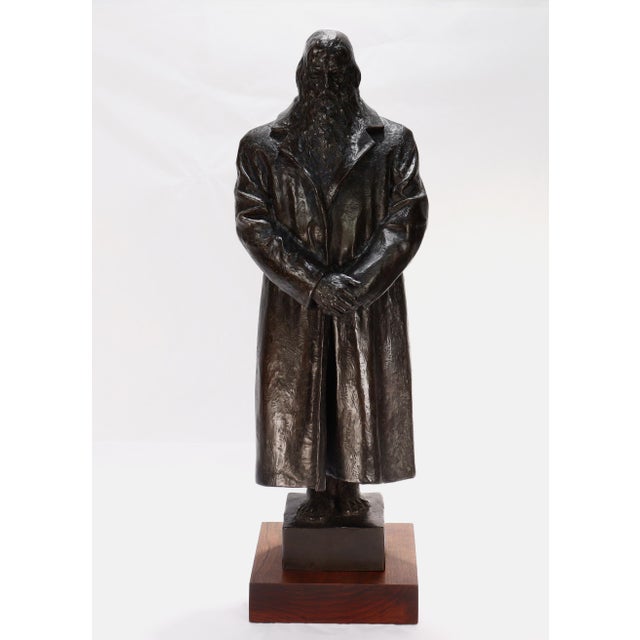 A fine signed bronze sculpture. Entitled: "Elder" By Julia Levitina. Depicting of a full figure male standing erect and...