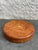 Round turn wood teak tray. Made from a single piece of wood. The remnants of the original paper label is located on the...