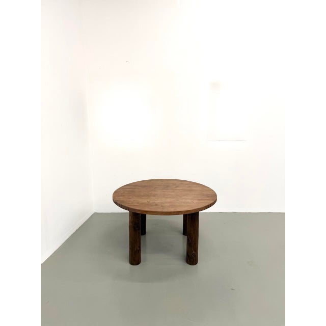 Antique round dining table with four solid round legs. We love the overall 1950s look (it was likely made later), with its...