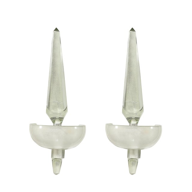 This striking Pair of Modernist Murano Obelisk Sconces in Pearlescent Glass with 24-Karat White Gold originates from Italy...