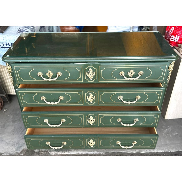 Baker Collector's limited edition hand painted green and gold lacquered four-drawer occasional chest of drawers. Painted...