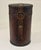 Handsome leather covered cylindrical case believed to have originally housed a single liquor bottle or spirits decanter....