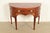 An exceptional Federal or Hepplewhite style demilune cabinet or sideboard By Baker Furniture USA, Circa 1980s Mahogany,...