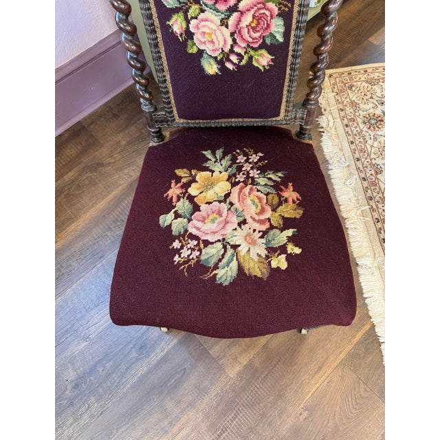 Victorian Style side chair featuring elaborate gothic revival carvings and needlepoint upholstery. Popular in the 19th...