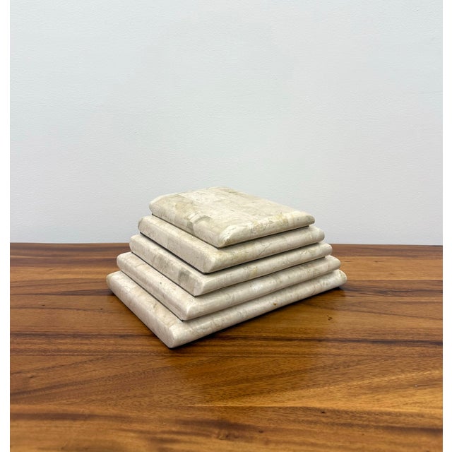 A distinctive vintage tessellated stone box showcasing a bold stepped pyramid design and a fitted lid. Handcrafted from...