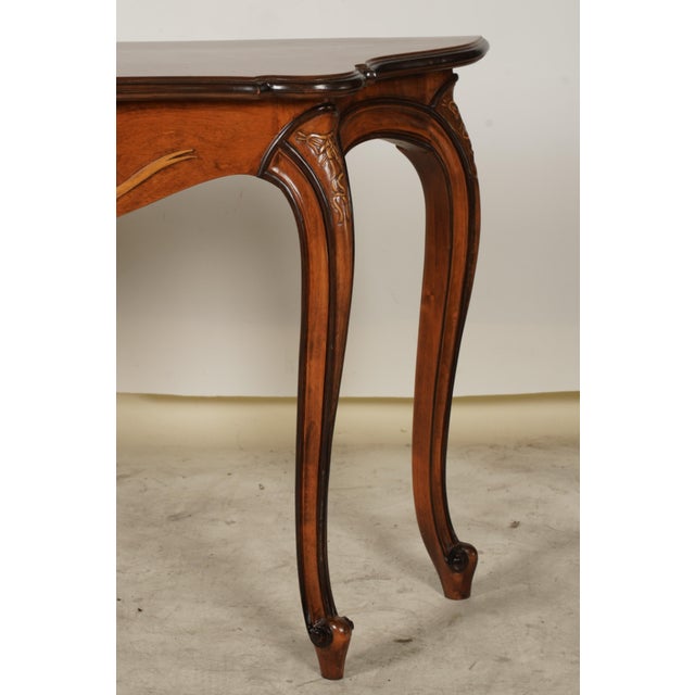 An Art Nouveau-style Sofa Table with relief-carved apron and shoulders. Pure elegance, grace sophistication. I haven't...