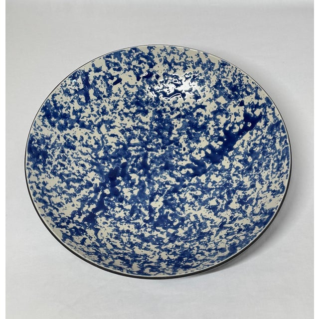 Revol France Collector’s Edition hand painted blue on cream ground spongeware pottery bowl. 9.5” diameter. 2.25” height.