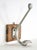 Vintage European wall hook made of an aluminum two arm hook mounted on a wood base. The original mounting screws are not...