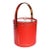 Mid-century modern round red ice bucket with handle, acrylic lid, and brass details. In a bright red, with clean lines,...