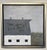 This artwork features a minimalist representation of a grey barn under a muted sky, emphasizing simplicity and...