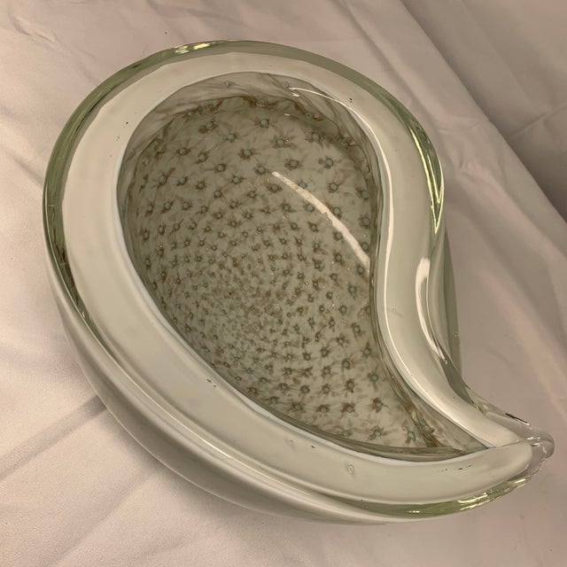 The piece displays all the hallmarks of a classic Barbini biomorphic design from the 1950s. It is constructed using the...