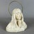 An evocative devotional bust depicting the virgin mary in prayer, an original glazed ceramic sculpture signed by the...