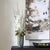 Graceful And Refined, This Tall Orchid Arrangement Brings An Elevated Sense Of Natural Beauty To Any Space. Towering White...