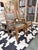 A beautifully crafted pair of Stickley upholstered cottage arm chairs inspired by the enduring principles of American Arts...