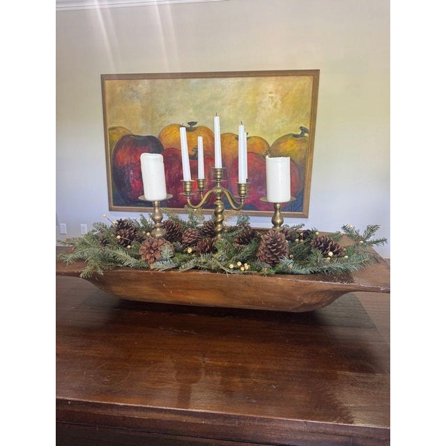 Antique large wooden dough bowl, also known as a trencher bowl, dating to the early 20th century. Hand-carved from a...