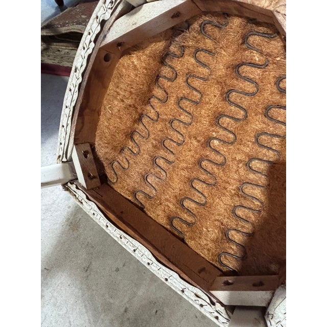 A vintage club chair, circa 1950.Very comfortable. Upholstered in high quality white faux leather. Very good condition