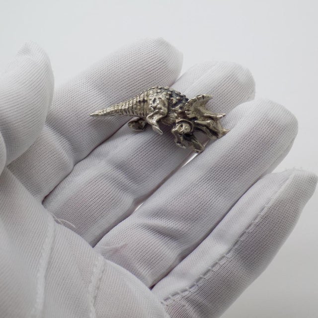 Dive into the prehistoric world with this fascinating Triceratops miniature, handcrafted in Italy during the 1960s and...