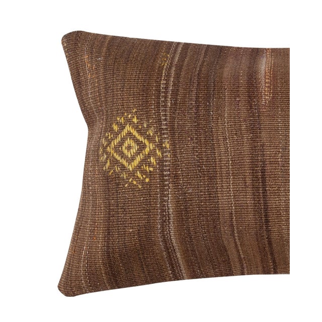 Add a touch of history and warmth to your space with this vintage handmade Turkish wool kilim cushion cover. Crafted from...