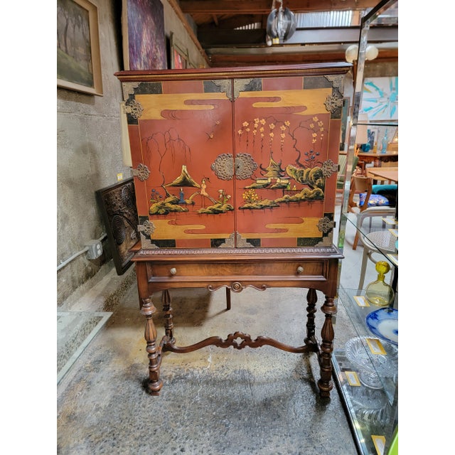 Hand painted Chinoiserie 2 door cabinet. America, circa. 1930's. Attributed to Baker Furniture.