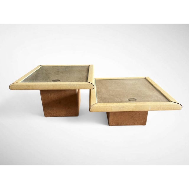 Stunning pair of side tables designed by Carlo Bartoli for Rossi di Albizzate in the 1980's. Fine leather, suede and a...