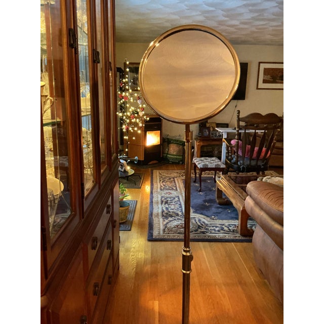 A rare and discontinued Restoration Hardware Adjustable Floor Makeup Mirror from the early 2000s, crafted in solid metal...