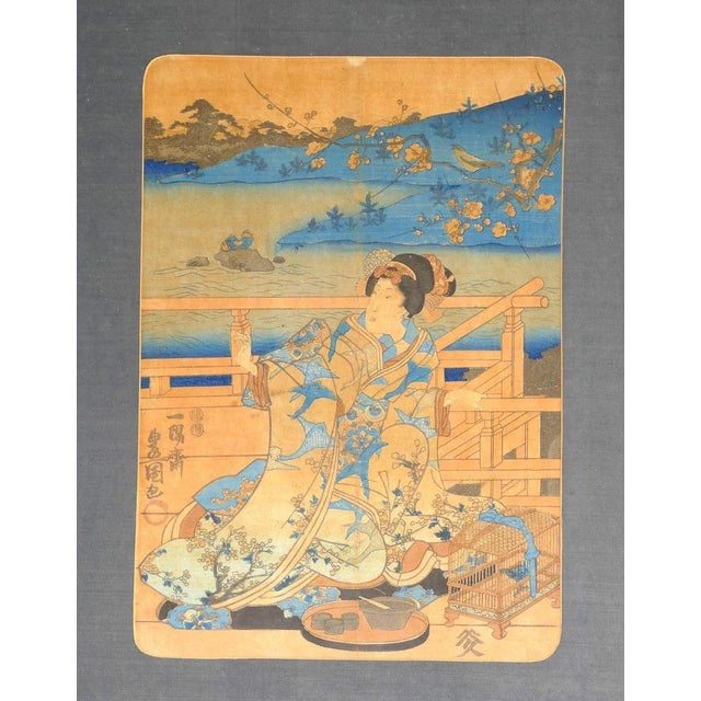 Japanese Woman is a beautiful print realized around 1830 by Utagawa Kunisada. Original colored woodblock print. This...