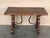 19th century Spanish trestle table in walnut. This piece has a great scale, lovely carved lyre legs and beautiful ebonized...