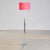 Elegant floor lamp with magenta lampshade on chrome base in nice condition Up to 250V (Europe/UK Standard).The wiring of...