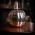 A vintage 20th century italian silver plated ice bucket in the form of a pumpkin. Upon lifting the lid a glass liner is...