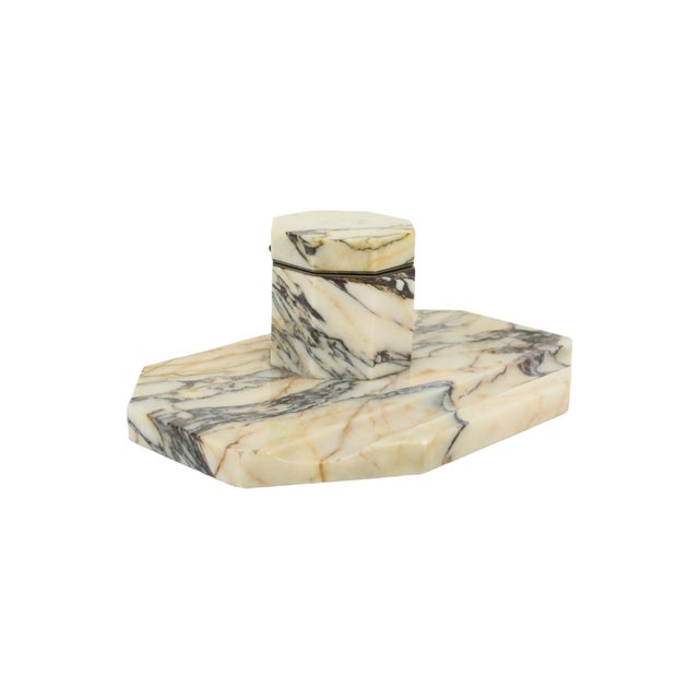 Art Deco inkstand/desk set featuring an inkwell and pen holder, crafted from white marble with black veining; a vintage...