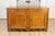 A French Louis XV period walnut buffet from circa 1770 with two drawers over carved doors and skirt. This French Louis XV...