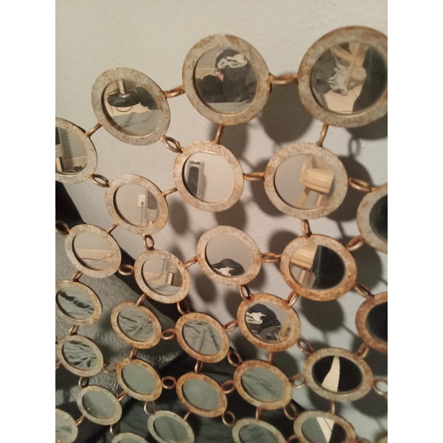 Fabulous eye-catching quasi-sunburst style burnished gilt metal decorative wall art mirror, ready to make a bold statement...