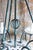 A large hanging pendant chandelier in alabaster and painted verdigris. 1980s or 1990s but with an antique style. Green...
