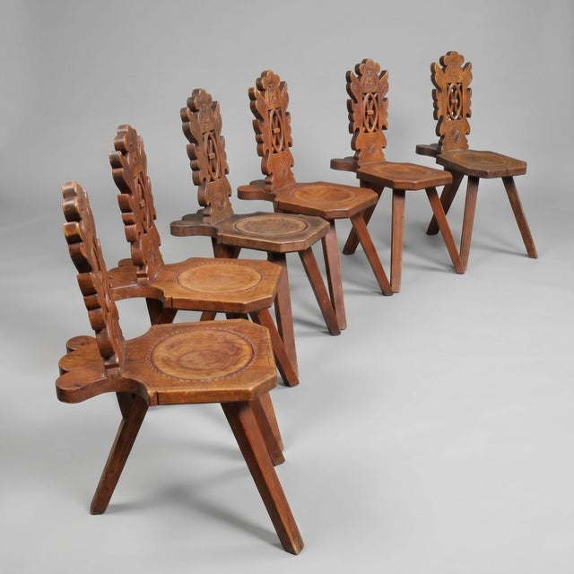 This remarkable set of six solid walnut chairs embodies the very essence of late 19th-century Haute Époque style...